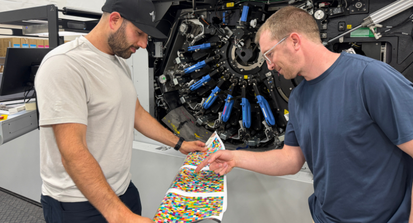 Checking print quality from the HP Indigo 25K digital press.